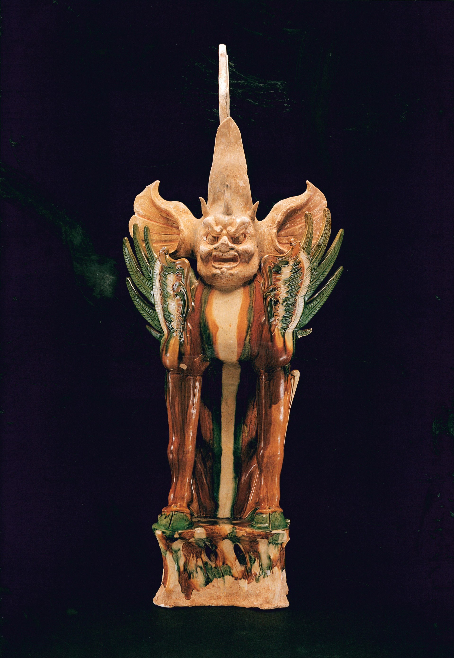 Pottery tomb guardian in sancai glaze
